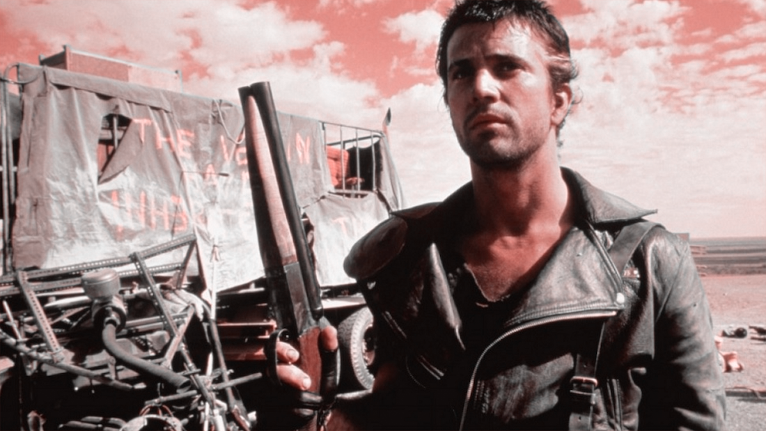 In The Road Warrior (Mad Max 2), the raiders wear dark and the good guys  wear light colors, except Max. He's the necessary evil that can deliver the  people from the wasteland. :