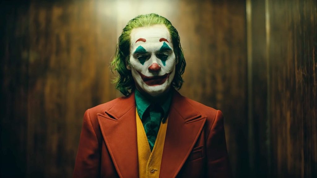 Joker (Joaquin Phoenix) standing in an elevator in 'Joker'