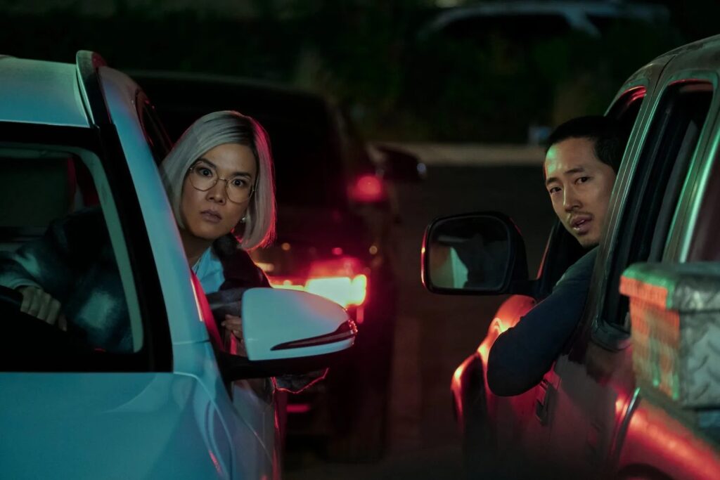 Danny Cho (Steven Yeun), and Amy Lau (Ali Wong) talking through cars in 'Beef,' What Sets These 2024 Emmy-Winning Scripts Apart?