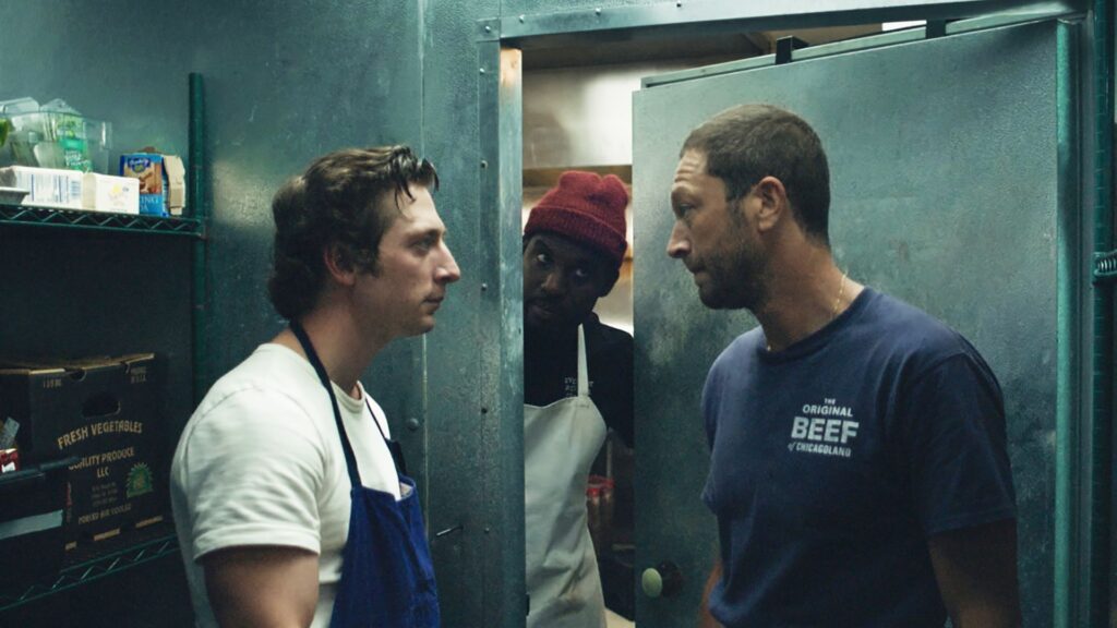 Carmy (Jeremy Allen White) and Richie (Ebon Moss-Bachrach) talking in the walk-in fridge in 'The Bear'
