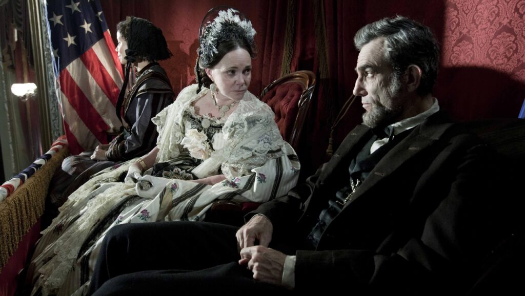 Abraham Lincoln (Daniel Day-Lewis) sitting next to Mary Todd Lincoln (Sally Field) in a theater box in 'Lincoln'
