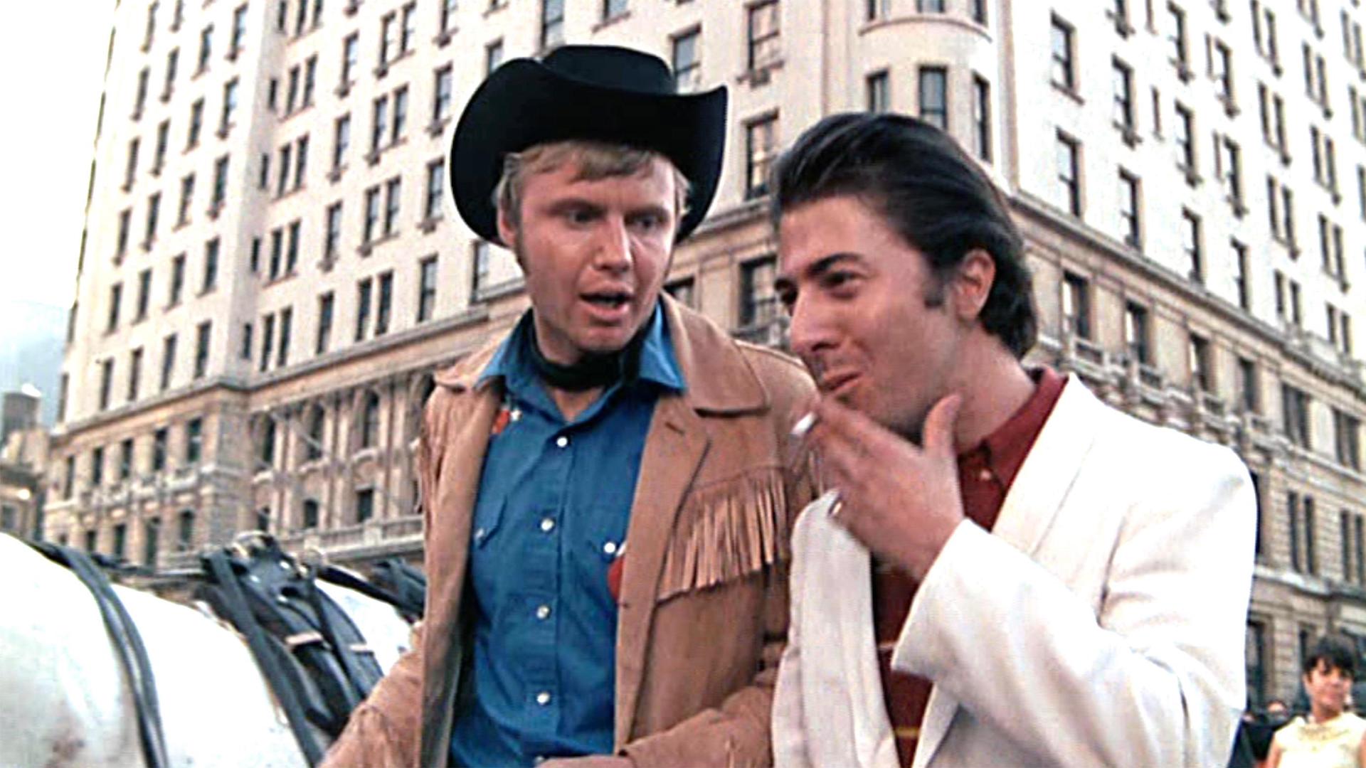 Ratso (Dustin Hoffman) and Joe (Jon Voight) walking and talking in New York City in 'Midnight Cowboy'