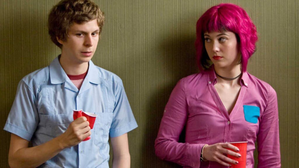 Scott Pilgrim (Michael Cera) and Ramona Flowers (Mary Elizabeth Winstead) standing next to each other with Solo Cups at a party in 'Scott Pilgrim vs. the World'