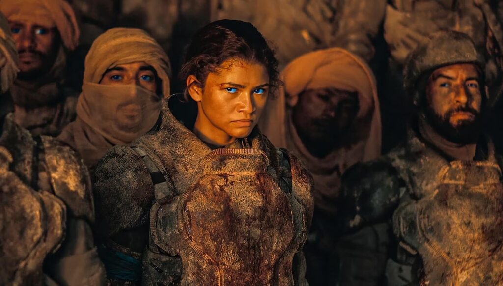 Chani (Zendaya) looking at Paul in 'Dune: Part Two,' 100 Epic Journey Story Prompts