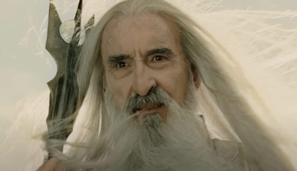 Saruman the White (Christopher Lee) looking down at the Fellowship in 'The Lord of the Rings: The Return of the King,' 10 Villain Archetypes Found in Movies and TV