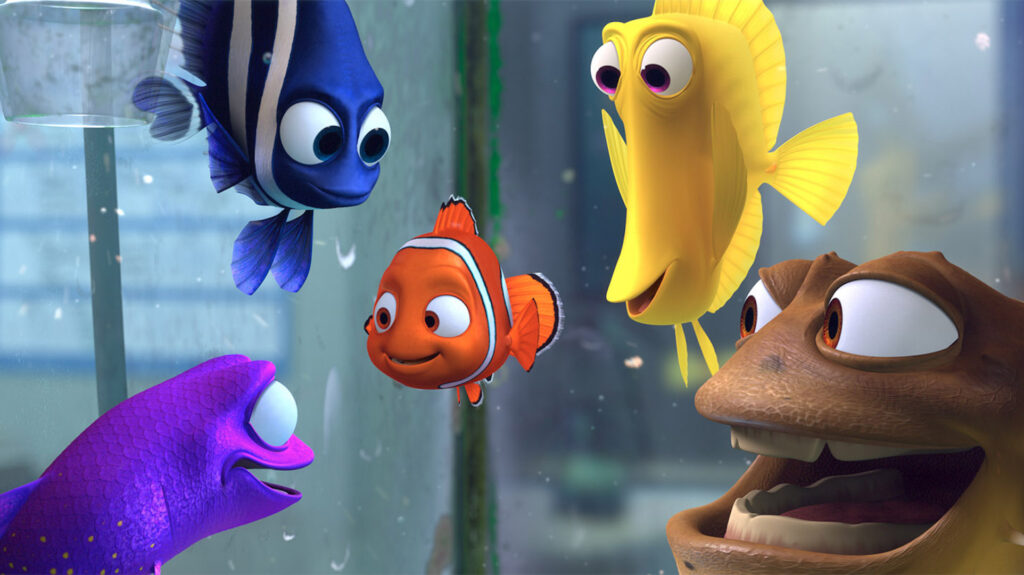 Four fishes in the dentist fish tank smiling at Nemo in 'Finding Nemo,' Breaking Down the Character Archetypes of the Hero’s Journey