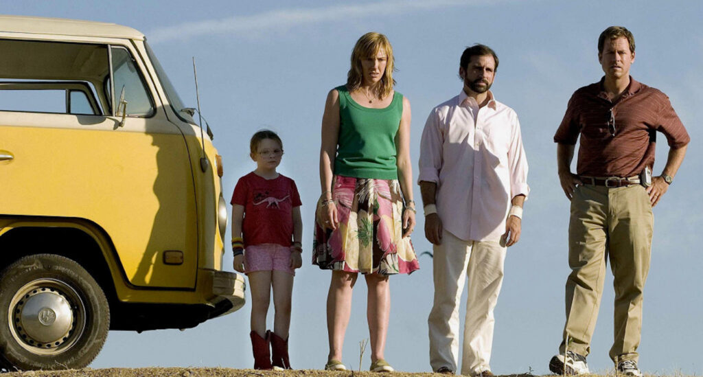 A family standing on the side of the road next to a yellow van in 'Little Miss Sunshine,' Industry Lingo Every Screenwriter Needs to Know to Succeed