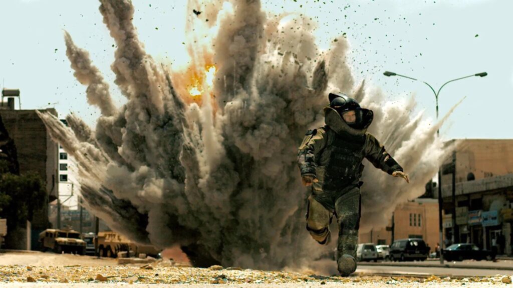 Staff Sergeant William James (Jeremy Renner) running from an explosion in 'The Hurt Locker,' 5 Trademarks of Kathryn Bigelow Films