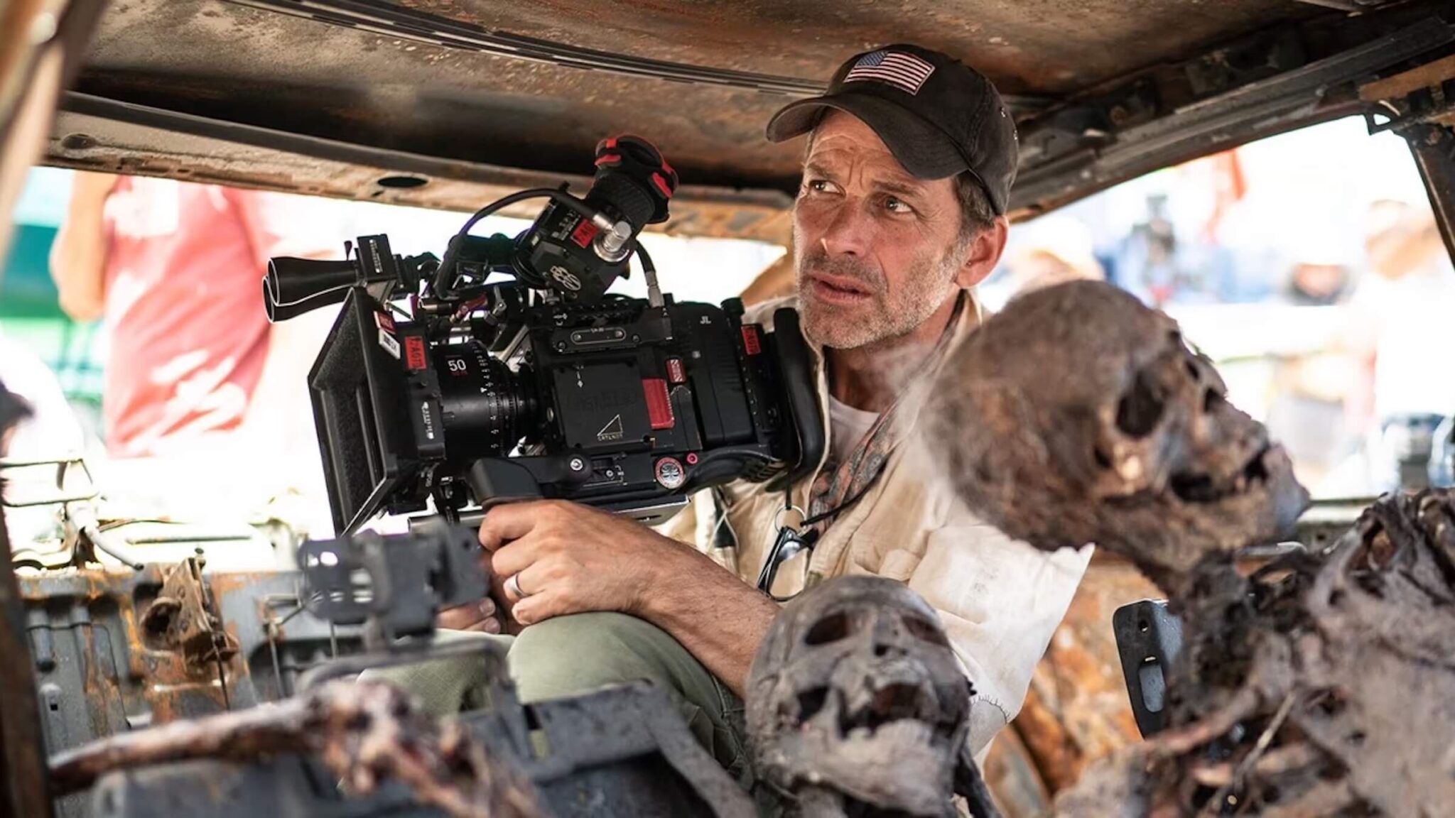 Zack Snyder behind the camera in a car filled with skeletons on 'Army of the Dead,' 5 Trademarks of Zack Snyder Movies