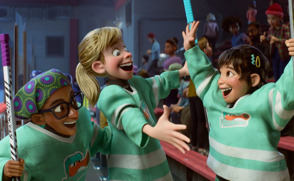 Riley (Kensington Tallman) celebrating a hockey game with her friends in 'Inside Out 2'