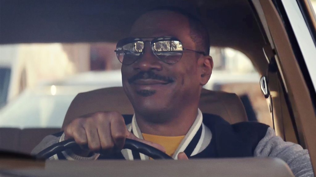 Axel (Eddie Murphy) driving in 'Beverly Hills Cop: Axel F' (2024)