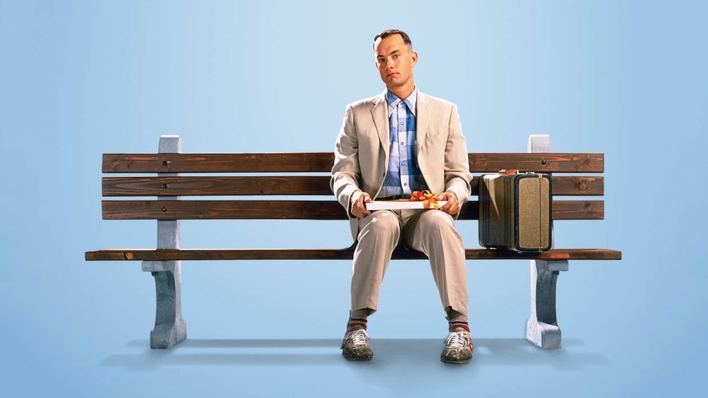 Forrest Gump (Tom Hanks) sitting on a park bench in 'Forrest Gump,' Script Apart: How 'Forrest Gump' Screenwriter Eric Roth Finds the Heart of the Story