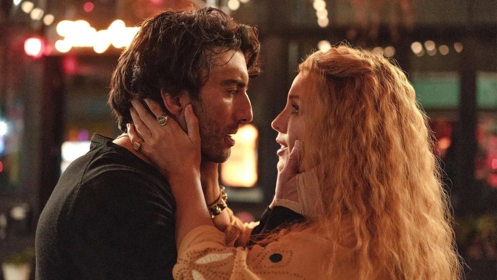 Lily Bloom (Blake Lively) and Ryle Kincaid (Justin Baldoni) about to kiss in 'It Ends With Us'