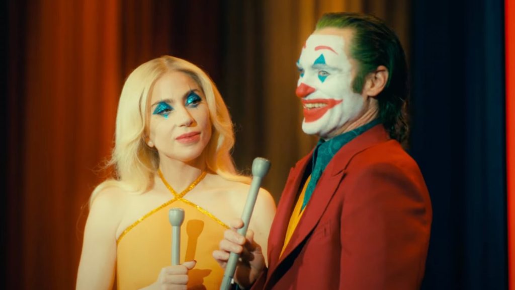 Harley Quinn (Lady Gaga) and the Joker (Joaquin Phoenix) hosting a talk show in 'Joker: Folie à Deux'