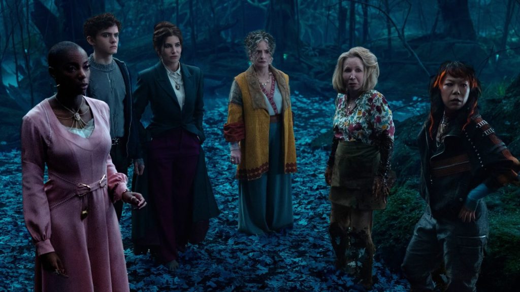 Agatha Harkness (Kathryn Hahn) with her coven on the Witches' Road in 'Agatha All Along'