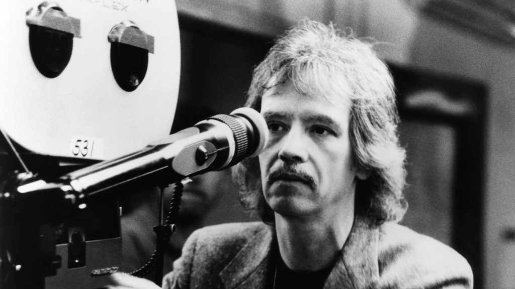 John Carpenter behind the camera of a film; 5 Trademarks of John Carpenter Movies