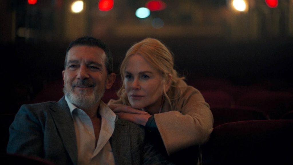 Romey (Nicole Kidman) and Jacob (Antonio Banderas) sitting in a theater.