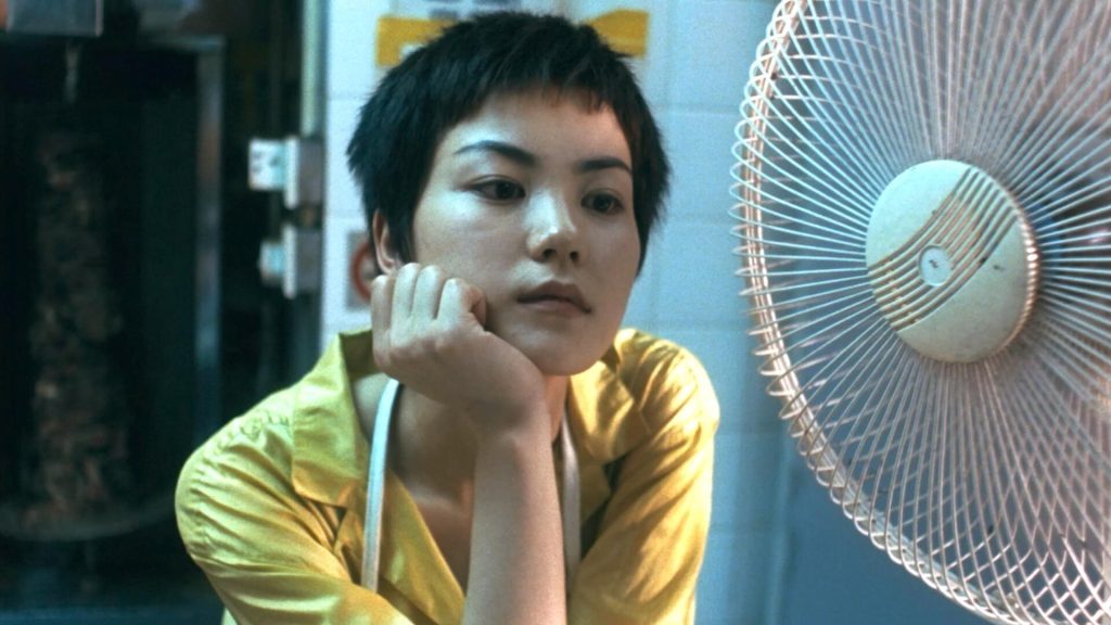 Faye Wong daydreaming at work in 