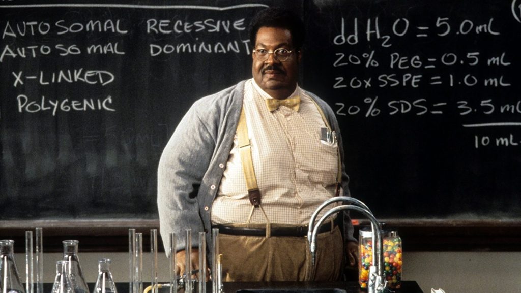 Professor Sherman Crump (Eddie Murphy) stands in front of the blackboard.